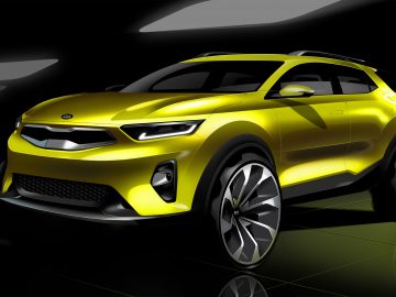 Een weergave van een gele Kia Stonic B-segment crossover in een donkere kamer.