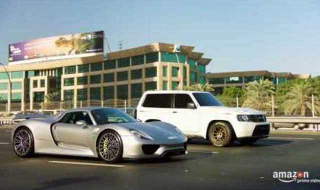 Porsche 918 vs Nissan Patrol