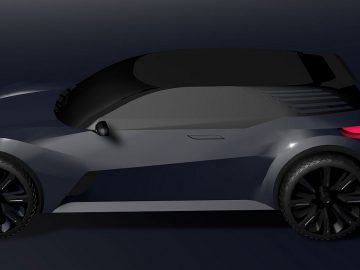 Een weergave van een stijlvolle hatchback op een donkere achtergrond.
