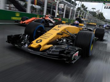 Een geel-zwarte F1 2017-raceauto op een natte baan.