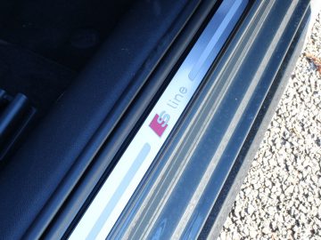 Een close-up van de deurklink van een Audi A1.