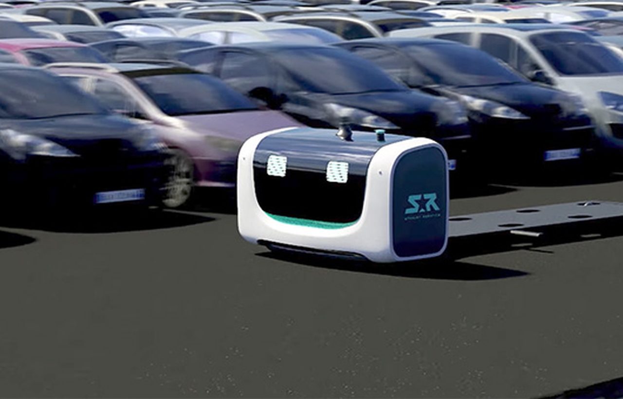 Stan's auto staat geparkeerd op een parkeerplaats.