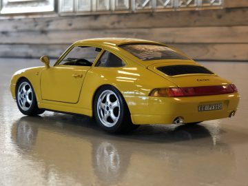 AutoRAI in Miniatuur - Porsche 911 993 van Bburago