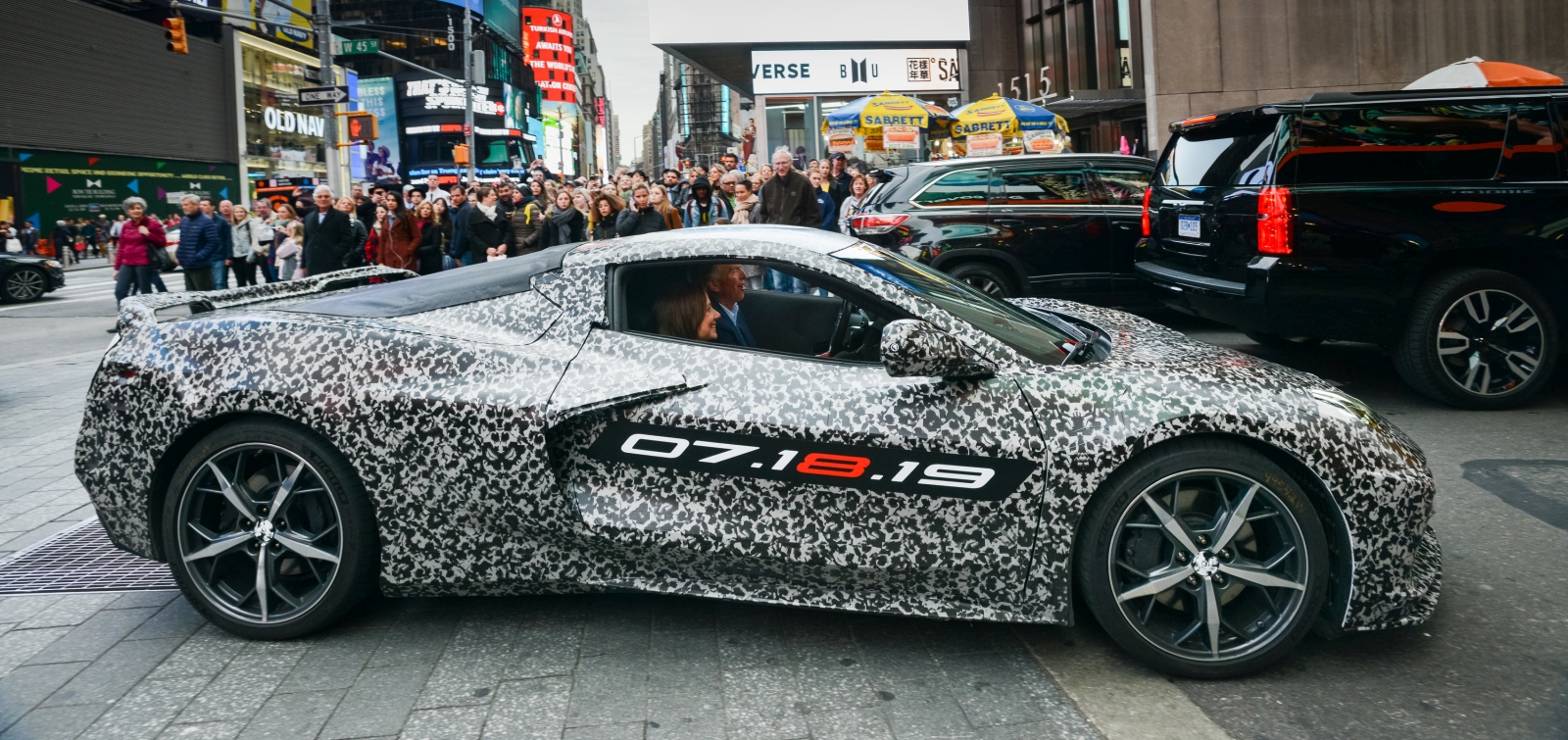 Chevrolet Corvette Chief Engineer Tadge Juechter and General Motors Chairman and CEO Mary Barra drive in a camouflaged next generation Corvette down 7th Avenue near Times Square Thursday, April 11, 2019 in New York, New York. The next generation Corvette will be unveiled on July 18. (Photo by Jennifer Altman for Chevrolet)
