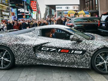 Chevrolet Corvette Chief Engineer Tadge Juechter and General Motors Chairman and CEO Mary Barra drive in a camouflaged next generation Corvette down 7th Avenue near Times Square Thursday, April 11, 2019 in New York, New York. The next generation Corvette will be unveiled on July 18. (Photo by Jennifer Altman for Chevrolet)