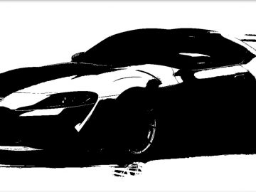 Een zwart-wit afbeelding van een Toyota-sportwagen.