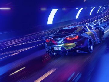 Een auto die 's nachts door een tunnel raast in Need for Speed Heat.