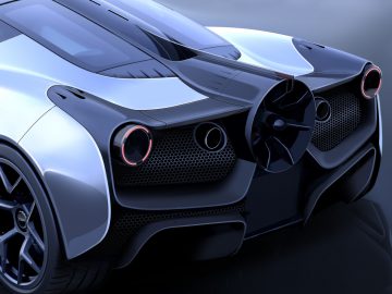 Het achteraanzicht van een futuristische sportwagen van Gordon Murray Automotive T.50.