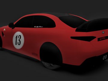 Rode Alfa Romeo Giulia GTA sportwagen met racenummer 13 op de zijkant, strak design en zwarte accenten.