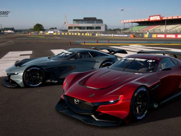 Twee krachtige Mazda RX-Vision GT3 Concept-raceauto's op een circuit, met het Gran Turismo-logo zichtbaar op de achtergrond.