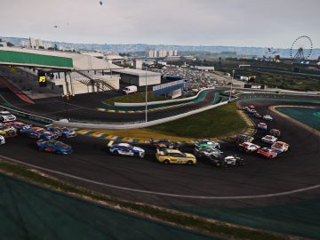 Toerwagens die door een krappe bocht navigeren op een Project Cars 3-racecircuit.