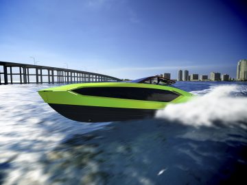 Hogesnelheids-Tecnomar voor Lamborghini 63-motorboot die over het water vaart bij een brug met de skyline van een stad op de achtergrond.