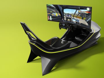 Een hightech Aston Martin-racesimulator met een breed gebogen scherm, een enkele stoel en een stuuropstelling tegen een groene achtergrond.