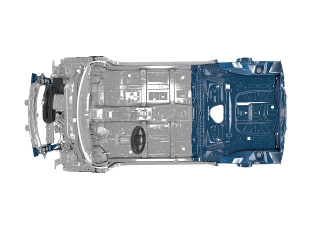 Bovenaanzicht van een transparant Toyota Aygo-chassis met het interne raamwerk en de componenten, inclusief het stuur en de voorste motorruimte.