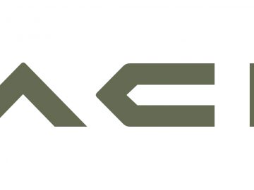 De afbeelding toont het Dacia-logo, met gestileerde, vetgedrukte letters die ‘DACIA’ spellen in een modern lettertype met hoekige vormen. De tekst is olijfgroen gekleurd.