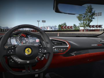 Uitzicht vanaf de bestuurdersstoel van een Ferrari 296 GTB, met het slanke stuur, het geavanceerde digitale dashboarddisplay en het spannende circuitlandschap op de achtergrond.