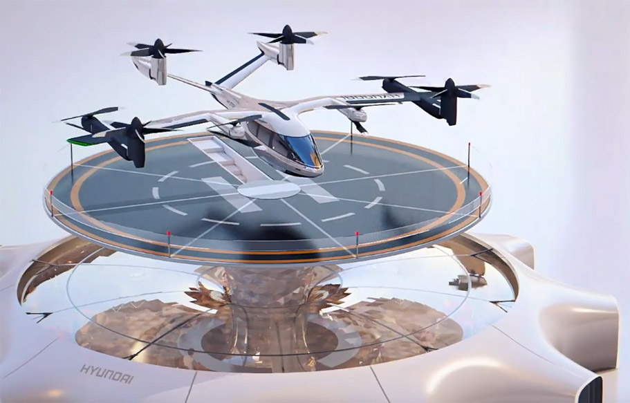 Een conceptafbeelding van een vliegende auto met het merk Supernal Hyundai die landt op een futuristisch rond landingsplatform. Het voertuig heeft vier sets propellers en lijkt zich in een stedelijke omgeving te bevinden.
