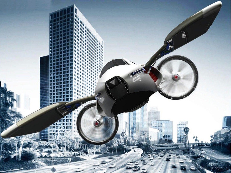 Een futuristische vliegende auto met vleugels en propellers zweeft boven een stadsgezicht met hoge gebouwen en een drukke snelweg eronder, klaar om in de lucht te gaan.