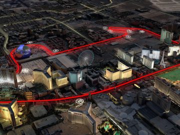 Een nachtelijke luchtfoto van een stad met verlichte gebouwen. Een rode lijn op de afbeelding schetst een parcours dat door de straten van de stad slingert en lijkt op de GP Las Vegas-route, met genummerde punten die locaties onderweg markeren.