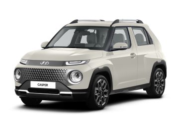 Een witte Hyundai Casper compacte SUV met een uniek frontontwerp met ronde koplampen en een opvallende grille wordt schuin vanaf de linkervoorzijde tentoongesteld, wat de kenmerkende stijl benadrukt.