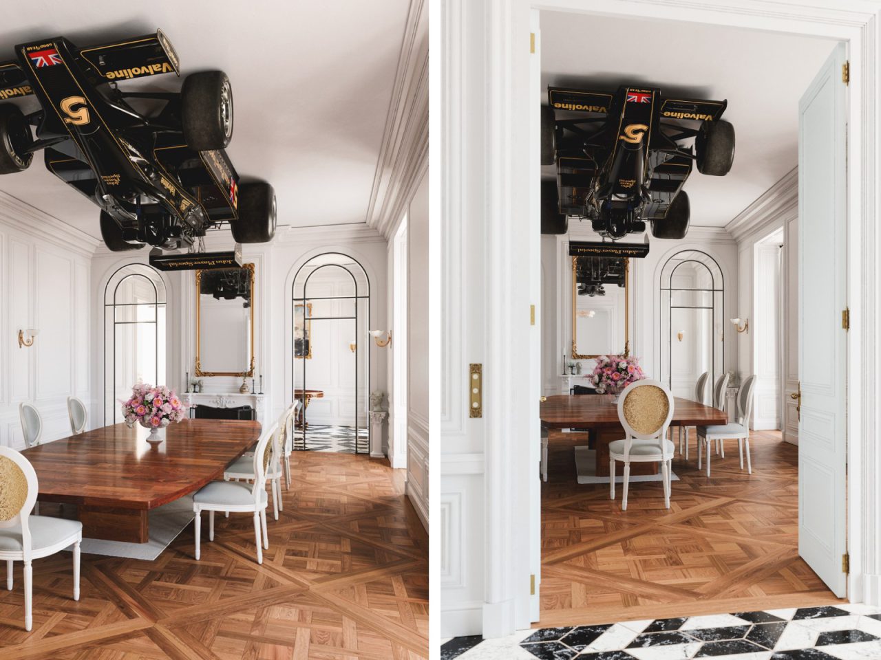 De moderne eetkamer van Lotus Appartement is voorzien van een lange houten tafel met witte stoelen, een bloemenstuk en een zwarte auto die ondersteboven aan het plafond hangt. De kamer heeft witte muren versierd met fotolijsten en grote spiegels.