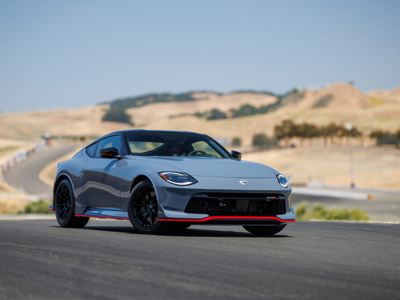The 2024 Nissan Z NISMO builds on the capabilities of the Z Sport and Performance grades to deliver an exhilarating track-ready experience for enthusiast drivers.