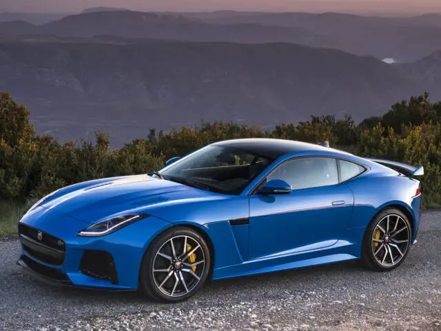 The 2020 Jaguar F-Type SVR is parked on a mountain road.