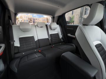 Inside view of the Citroën C3 showing the back seat with modern upholstery.