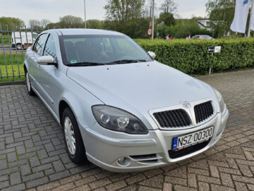 A silver Brilliance BS4 sedan with license plate 