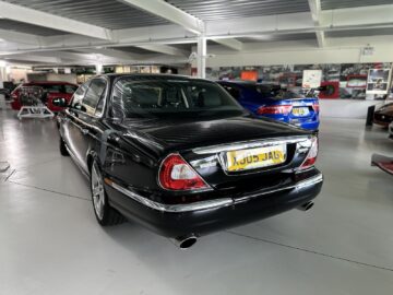 A black sedan with yellow license plate 