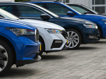 Prague, Czech Republic - 31 August 2021: Modern Skoda cars parked in a row on a  ...