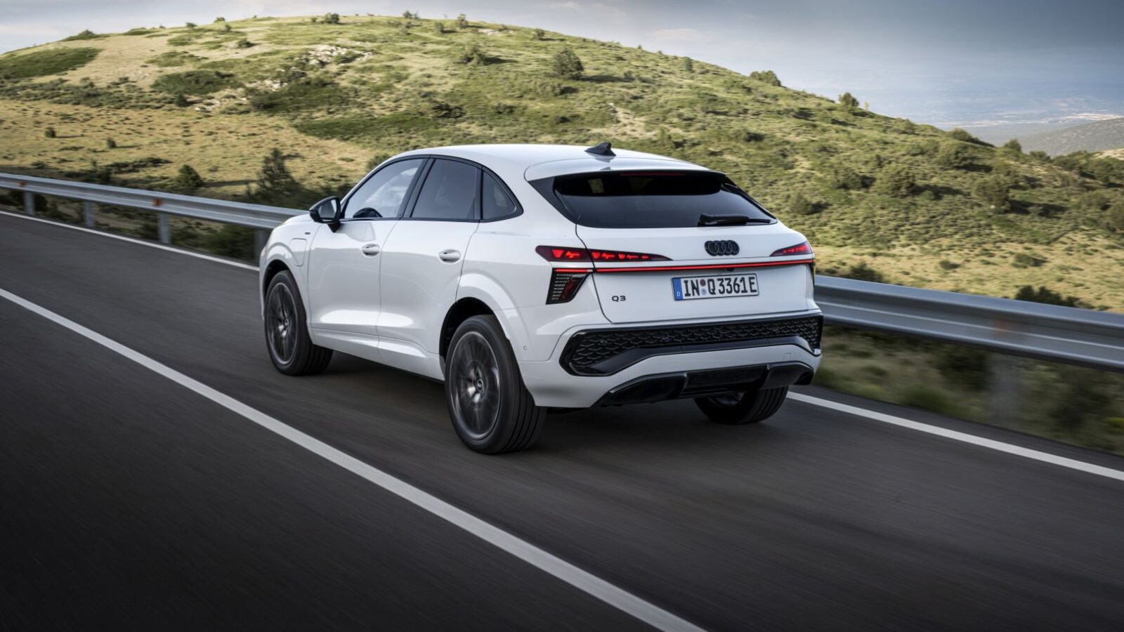 Glacier white metallic, dynamic outdoor shot, exterior, rear three-quarter view ...