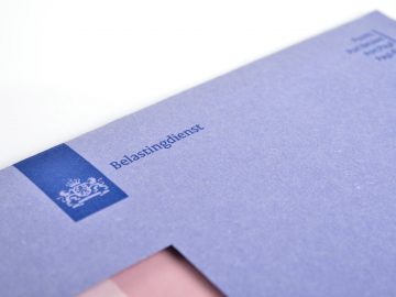 Blue Dutch tax envelope detail. ...