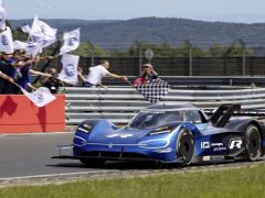 Volkswagen breaking the e-record at the Nürburgring-Nordschleife in 6:05.336 mi ...