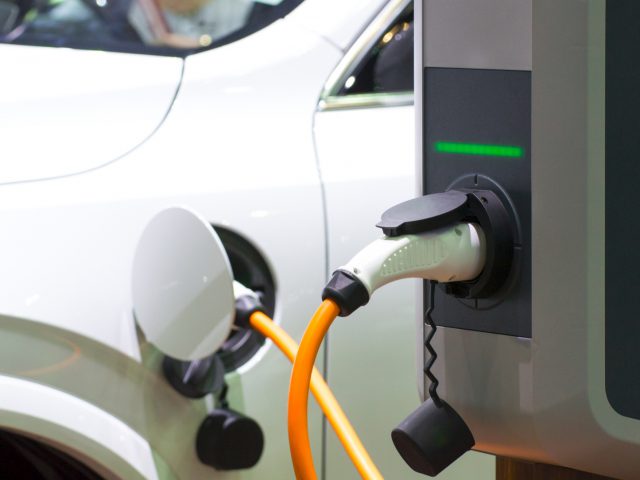 Power supply for electric car charging. Electric car charging station. Close up  ...